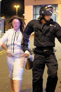 police arresting a shoplifter