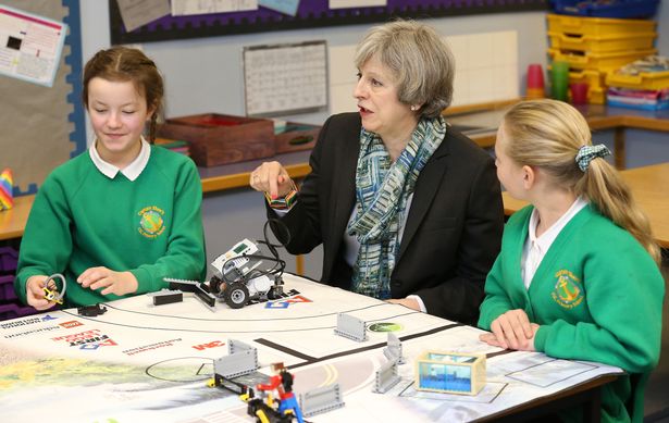 theresa may with school children
