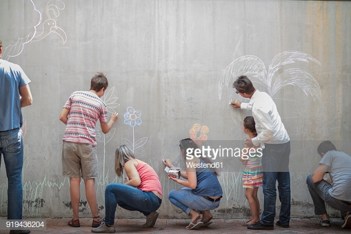 people painting on wall